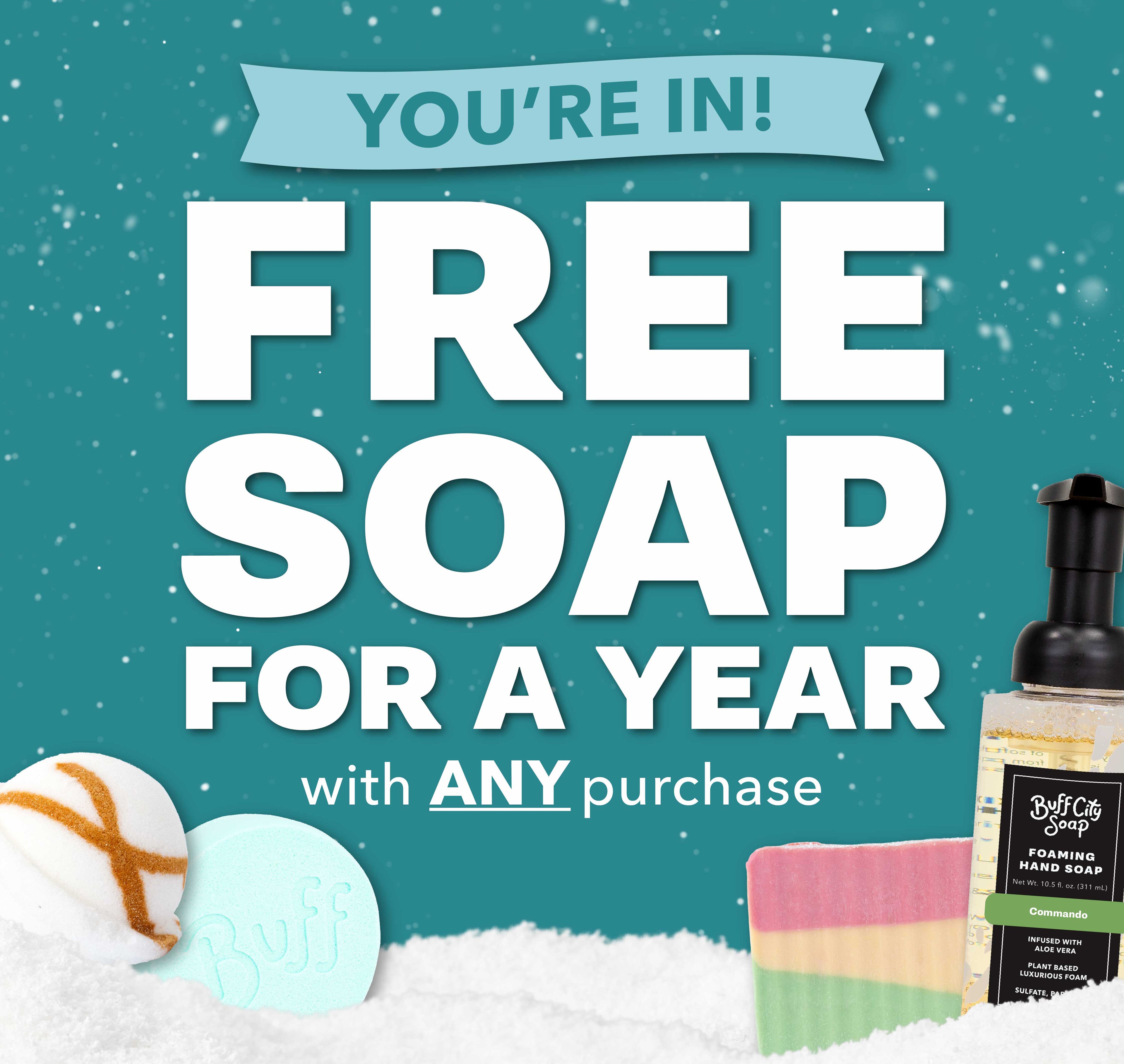 Promotional graphic for free soap for a year with any purchase offer, featuring bath products on a snowy background.