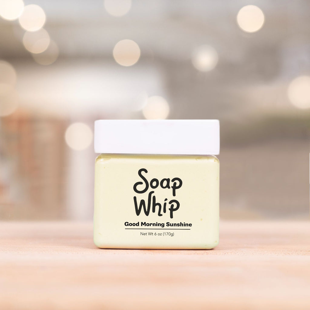 Yellow Good Morning Sunshine Soap Whip resting on wooden counter