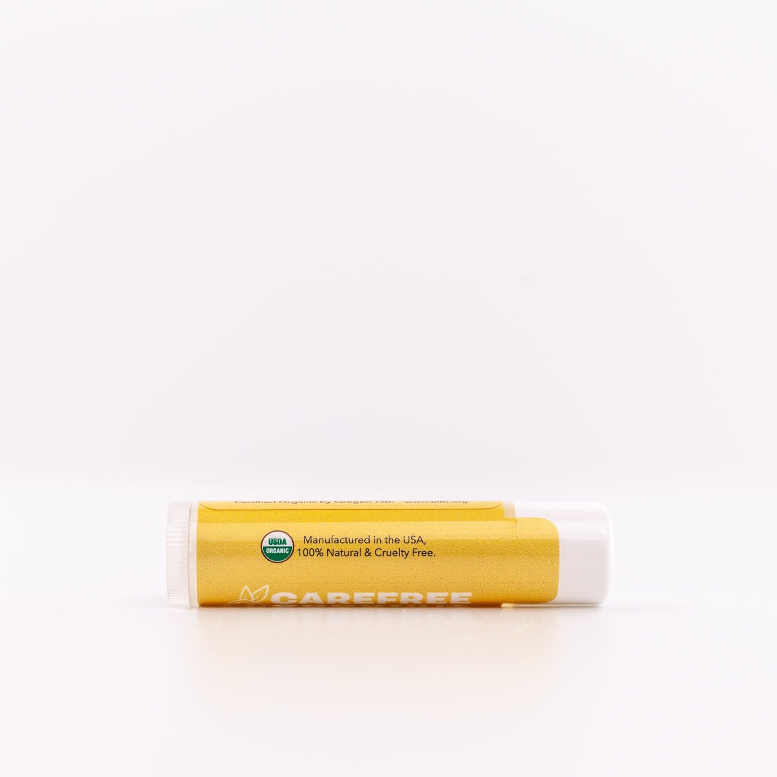 Yellow Lip Balm container tube against white background 