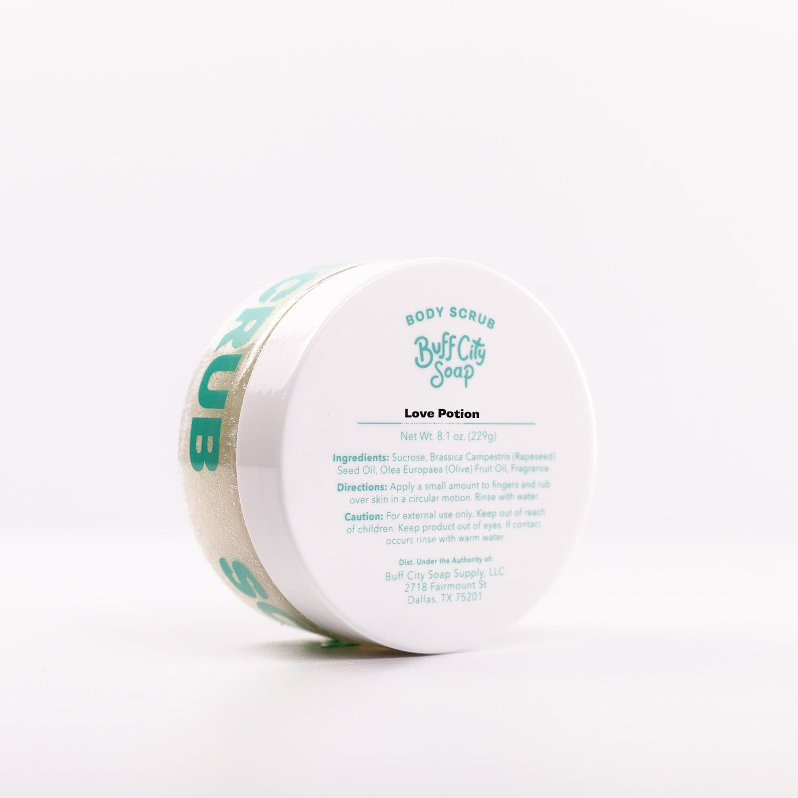 Top of Buff City Soap's love potion body scrub listing directions, ingredients, and cautions