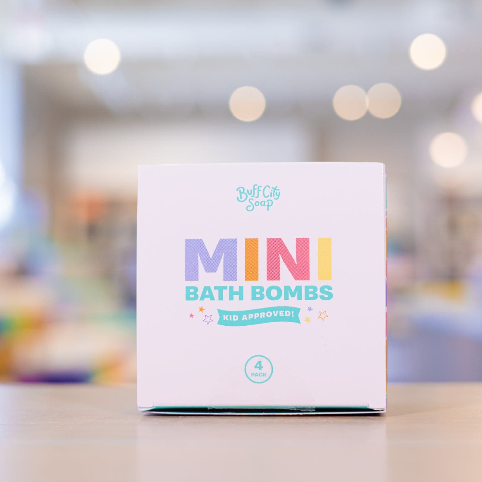 box of 4 kid approved Mini Bath Bombs 