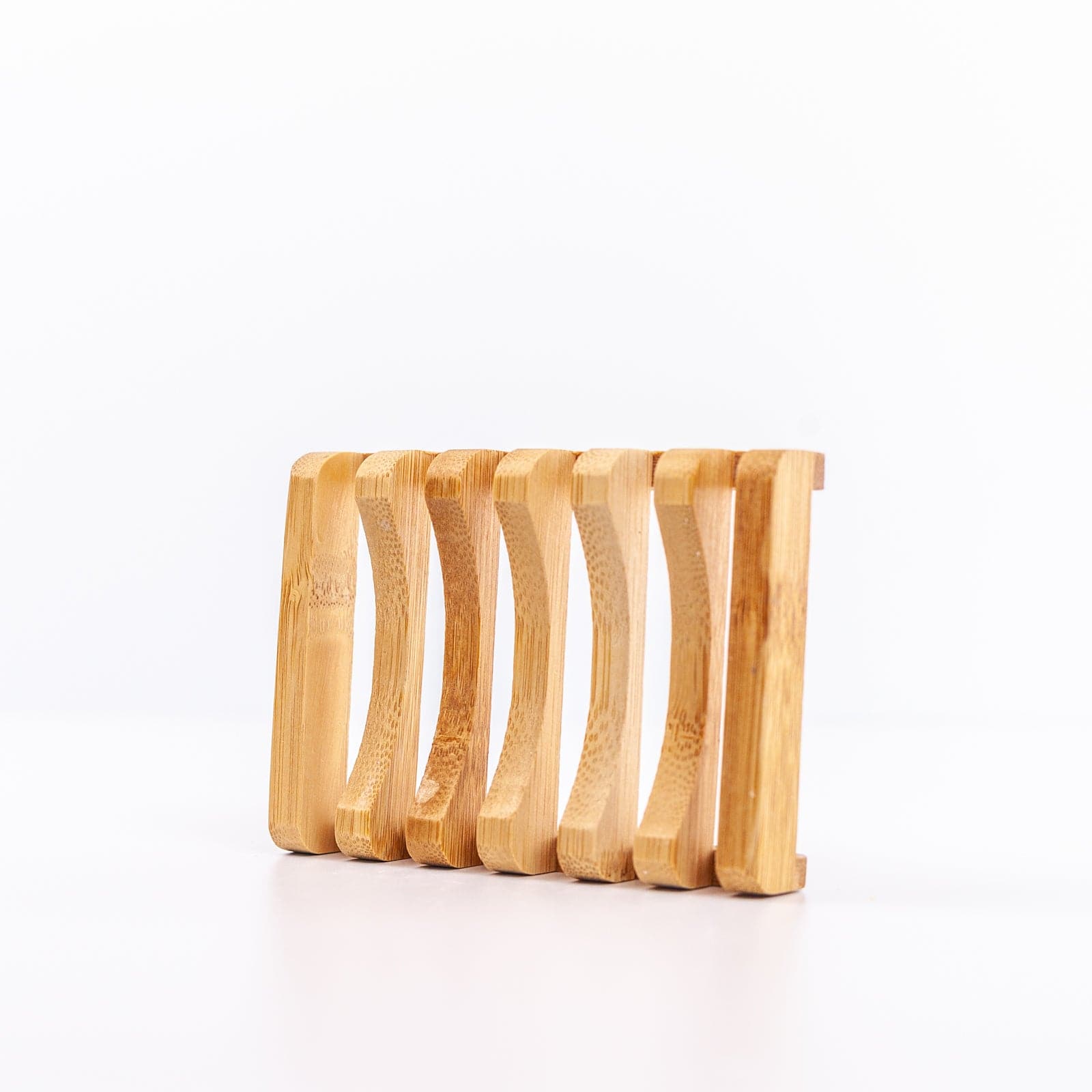 Angled view of wooden soap dish on its side